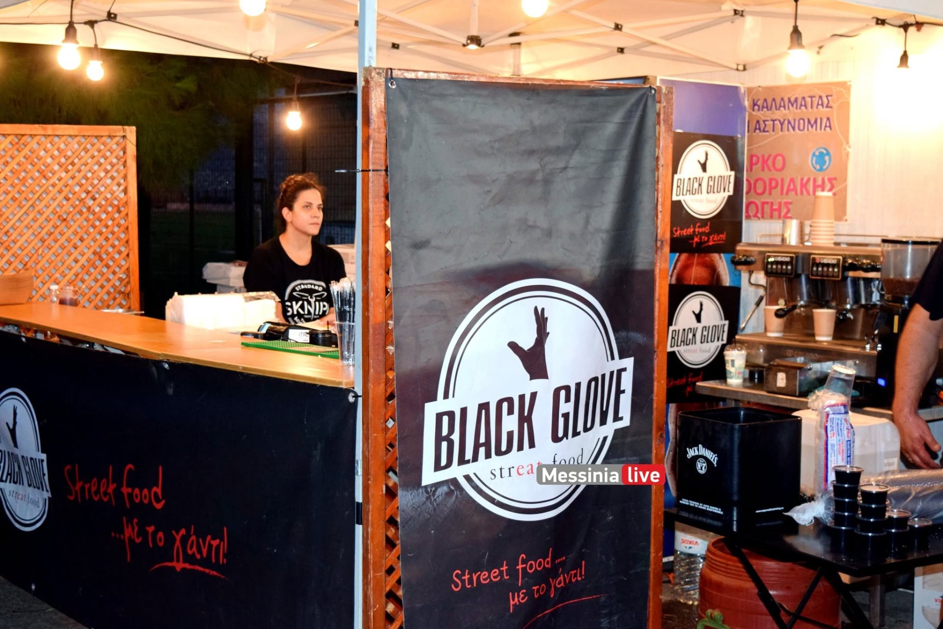 Black Glove event booth with branded banners